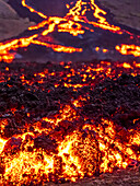 Glowing river of lava from Fagradalsfjall volcanic eruption at Geldingadalir, Iceland