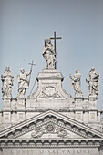 Statues at the top of the Basilica di San Giovanni in Laterano Rome Italy