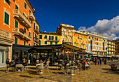 Terrace cafe on the lakeside promenade of Rapallo, Liguria, Riviera di Levante, Italy