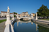 Moat around the public square with over 70 statues of historic townspeople at Prato della Valle, Padua, Italy.