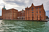 Lagoon view of the luxury hotel Molino Stucky (now: Hilton), Venice, Italy, Europe