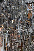 Lots of Christian crosses, crucifix. mountain of crosses. Schaulen, Lithuania, Baltic States.