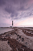 Sorve Tuletorn Lighthouse, Saare, Saaremaa, Estonia, Blatikum, Baltic Sea. stones beach.