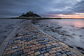 Path to St Michaels Mount, Cornwall, England. low tide, sunset