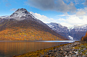 Jokelfjord and Oksfjordjokelen glaciers in autumn, Troms, Norway. Snowy peaks.