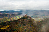 Forest and mountains in autumn, view from the Rehbergturm to Trifels Castle, Annweiler, Palatinate Forest, Rhineland-Palatinate, Germany
