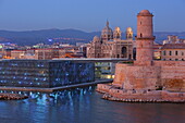 from left: MuCem (Museum of European and Mediterranean Civilizations), Cathedral de la Major and the Tour de Fanal of Fort Saint-Jean at the entrance of the Old Port of Marseille, Bouches-du-Rhone, Provence-Alpes-Cote d&#39; Azure, France
