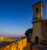 Bell tower of Notre-Dame d´Espérance in the Suquet district and panoramic view of the city and the bay of Cannes
