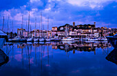 View of the marina and old town of Cannes in the morning light, Cannes, Alpes-Maritimes department, France