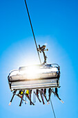 Skiers, chair lift, Compatsch, Alpe di Siusi, South Tyrol, Alto Adige, Italy