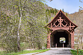 Beuron, historic wooden bridge over the Danube at Beuron Monastery, Upper Danube Nature Park in the Swabian Jura, Baden-Württemberg, Germany