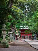 Romon Gate and stone lanterns, Kashima Jingu shrine and forest, Kashima, Japan