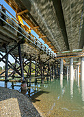 Underside of a new bridge being constructed alongside an old one, Gig Harbor, USA