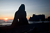 Ruby Beach at sunset, a rock arch and offshore island, USA