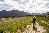 Young boy walking, Stanford Valley Guest Farm, Stanford, Western Cape, South Africa.