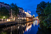 Holland Casino, blue hour in the morning, canal, Amsterdam, North Holland, Netherlands