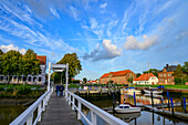 Wooden bridge for pedestrians, port with warehouse, Toenning, Eiderstedt Peninsula, North Friesland, North Sea coast, Schleswig Holstein, Germany, Europe