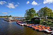 Pedal boat rental at the Treene, Friedrichstadt, North Friesland, North Sea coast, Schleswig Holstein, Germany, Europe