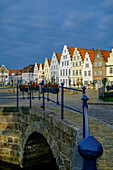 The Malerwinkel is located on the market square with a stone bridge in front, Friedrichstadt, North Friesland, North Sea coast, Schleswig Holstein, Germany, Europe