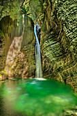 Kozjak Waterfall flows into rock pool, Kozjak Waterfall, Kobarid, Julian Alps, Triglav National Park, Slovenia
