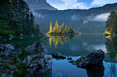 Small island in the Eibsee in early autumn, Grainau, Upper Bavaria, Bavaria, Germany