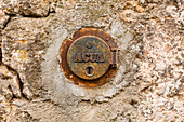 Cover with lock for the water connection with the text Aqua on a Portuguese house, Lamego, Portugal