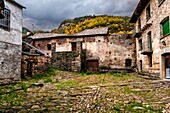 Old houses in Broto on an autumn cloudy day. Huesca. Aragon. Spain. Europe.