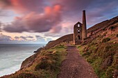 Towanroath Pump Engine House at Wheal Coates,near St Agnes on the north coast of Cornwall,captured from the South West Coast Path at sunset in late August.