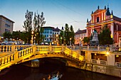 Franciscan Church of the Annunciation. Preseren square and the Triple Bridge. Ljubljana,Slovenia,Europe.