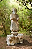 The South Gate Hittite sculpture statue of Hittite Storm God Tarhunzas ( Tara¸«unz Tara¸«unna or in Hurrian Teshub or in Phoenician Baal Krntrys ). 8th century BC. Karatepe Aslantas Open-Air Museum (Karatepe-AslantaŠŸ AcA±k Hava Muzesi),Osmaniye Province,Turkey.