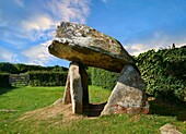 Carreg Coetan Quoit is a megalithic burial dolmen from the Neolithic period,circa 3000 BC,near Newport,North Pembrokeshire,Wales.