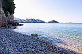 Kokkari, old town and sunrise beach in the evening light on Samos island in Greece