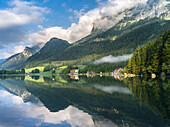 The romantic lake Hintersee , at morning with Reiter Alpe Mountain chain in the Nationalpark Berchtesgaden, Bavaria, Germany.