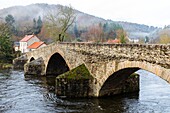 the menat bridge, medieval bridge situated between the towns of menat and saint remy de blot, menat, combrailles, (63) puy de dome, auvergne