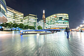 UK, London, Modern office buildings at night