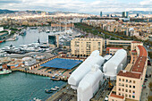 Spain, Barcelona, Harbor and cityscape