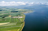 Netherlands, Zuid-Holland, Middelharnis, Aerial view of rural landscape and sea