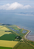 Netherlands, Zuid-Holland, Colijnsplaat, Aerial view of rural landscape and sea