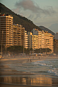 Brazil, Rio de Janeiro, Copacabana beach and apartment buildings at dawn