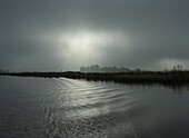 Friesland, Friesland, Broek, Lake on foggy and cloudy day