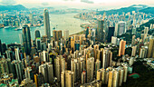 Aerial view of modern cityscape with Victoria Harbour in Hong Kong