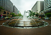 View of fountain and South Seas Centre in Urban Council Centenary Garden