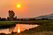 USA, Idaho, Bellevue, Sonnenuntergang im Spring Creek in ländlicher Landschaft