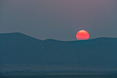 USA, Idaho, Bellevue, Sonnenuntergang über dem Horizont in der Nähe von Sun Valley