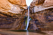 United States, Utah, Escalante, Waterfall in rocky terrain