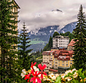 View from the waterfall bridge to the lower village of Bad Gastein and the Gastein valley, peaks of the Radhausberg massif in the background, Salzburger Land, Austria
