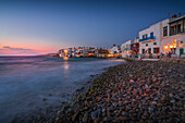 View of restaurants and pebble beach at Little Venice in Mykonos Town at night, Mykonos, Cyclades Islands, Greek Islands, Aegean Sea, Greece, Europe