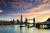 Tower Bridge, Butler's Wharf and The Shard at sunset taken from Wapping, London, England, United Kingdom, Europe