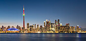 Toronto skyline featuring the CN Tower at night across Lake Ontario, Toronto, Ontario, Canada, North America