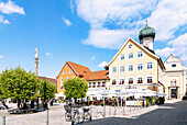 Marienplatz with Marian Column and Parish Church of St. Nicholas in Immenstadt im Allgäu in Bavaria in Germany